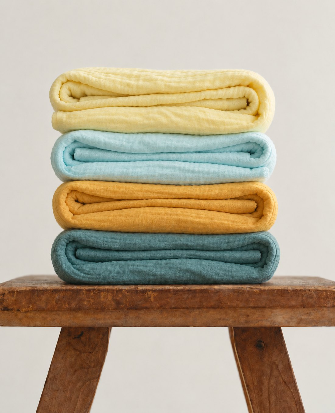 White Flowerr cotton muslin towels stacked